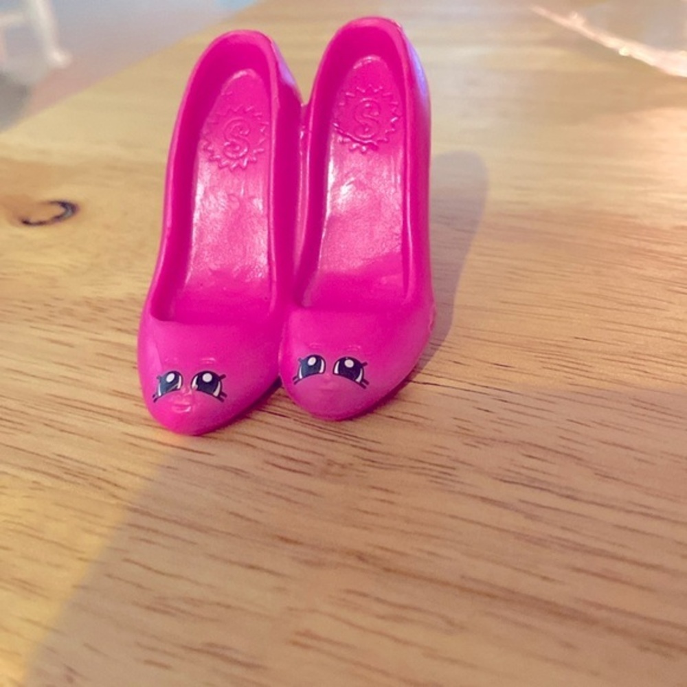 Shopkins pink heels. Heels attached to each other.